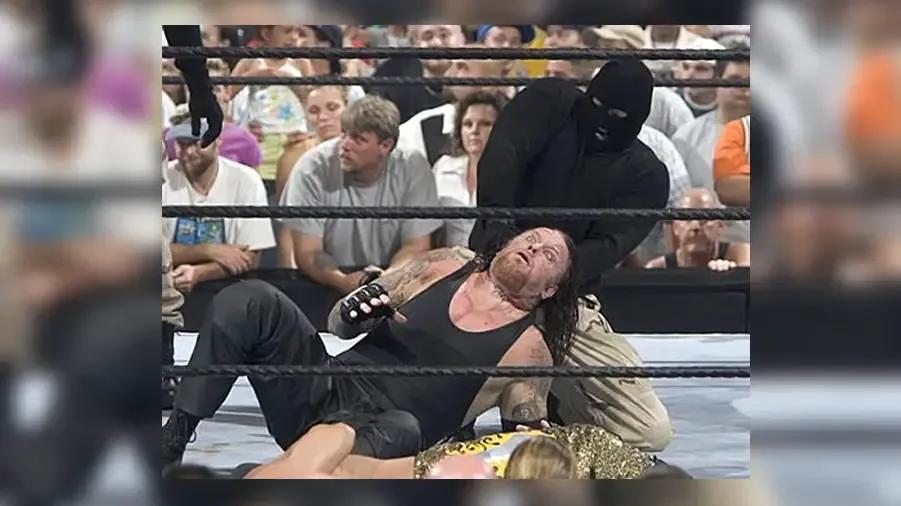 https://cultaholic.com/files/images/bde2bbc8fef18ec053a0e944bc5469793fc8b892-the-undertaker-terrorists.jpg