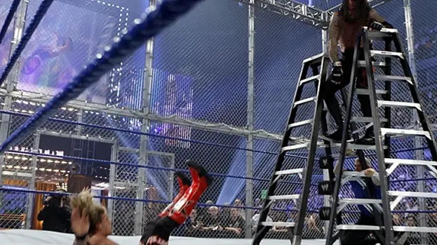 https://cultaholic.com/files/images/c4031dbd1250a2c62f373b4f994304ef7669b57e-the-undertaker-edge-summerslam-2008.jpg