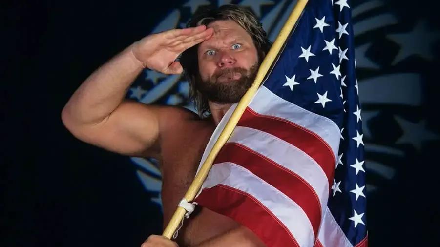 https://cultaholic.com/files/images/ff6bfdcdd112ba9df146c14d1b590c12d09df6ea-hacksaw-jim-duggan.jpg