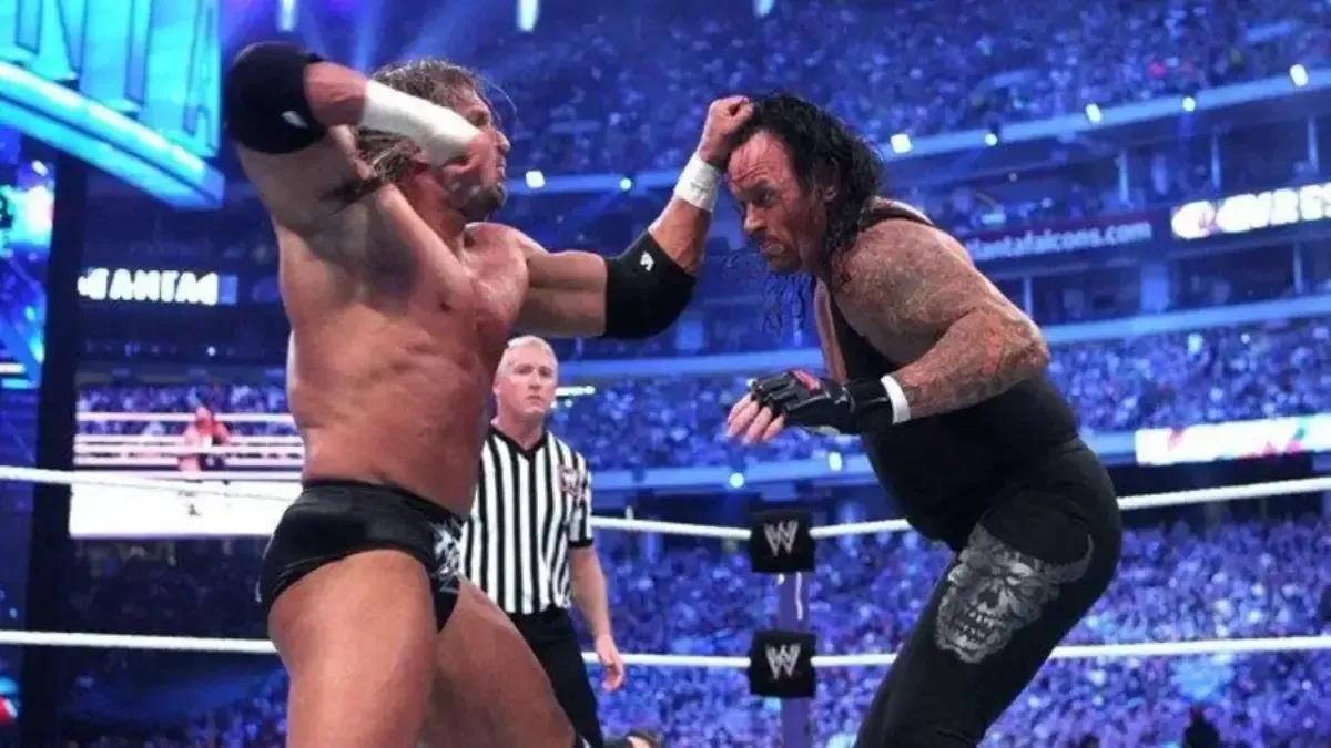 undertaker triple wrestlemania 27.jpg