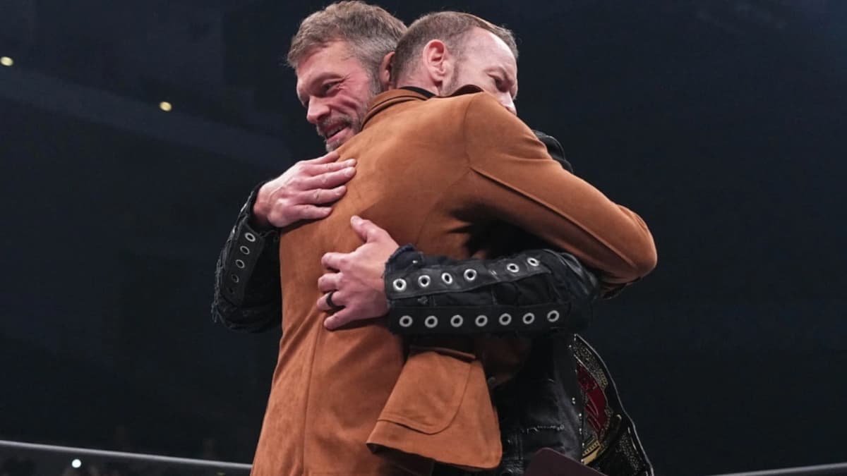 Adam Copeland and Christian Cage hugging