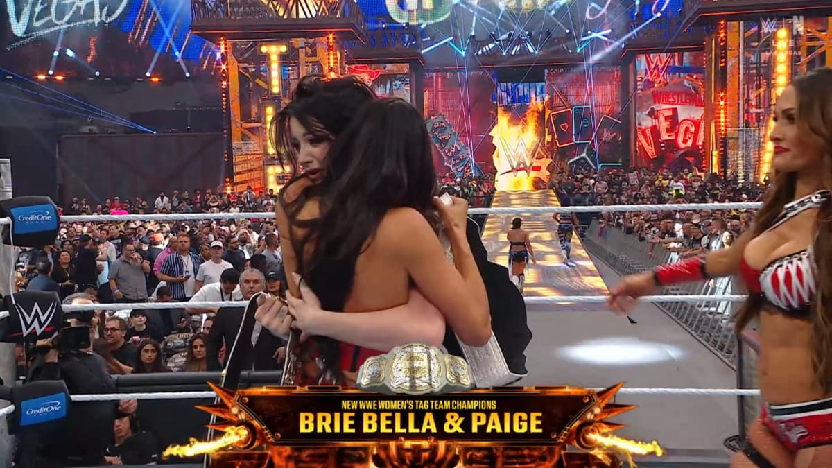 Paige hugging Brie Bella at WrestleMania 42