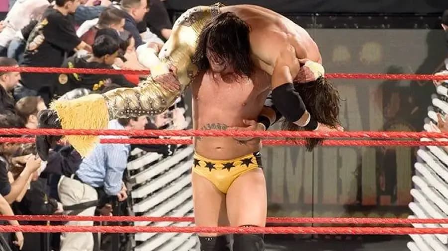 https://cultaholic.com/files/images/02a46c5f1ba0e1a63f12f0f638776b84272925f4-cm-punk-john-morrison-royal-rumble-2008.jpg