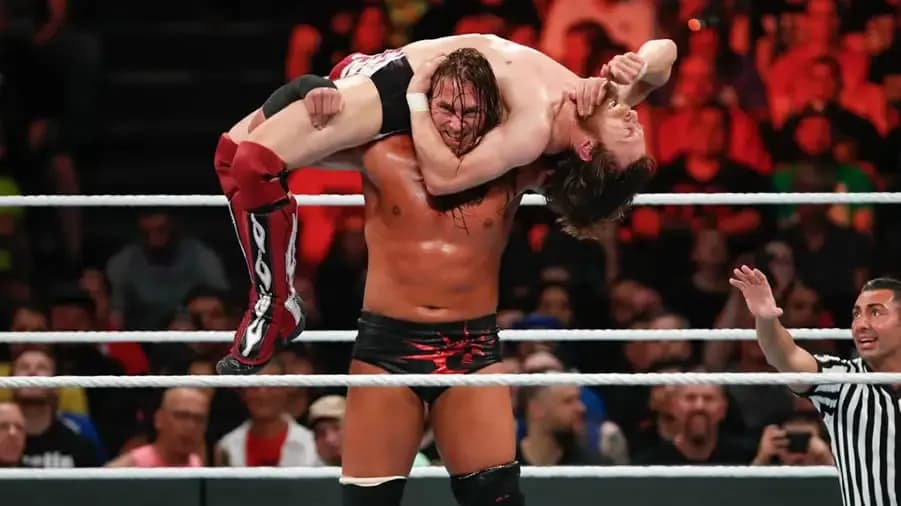 https://cultaholic.com/files/images/0ade8268580b4f633875375917970d2d3fb3631d-big-cass-daniel-bryan.jpg