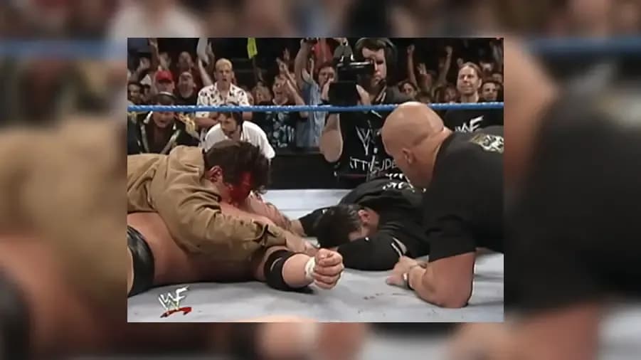 https://cultaholic.com/files/images/3d7773d006b3b9955e62a8d4a0c364bc22b67df9-stone-cold-steve-austin-vince-shane-triple-h-mcmahon-smackdown.jpg