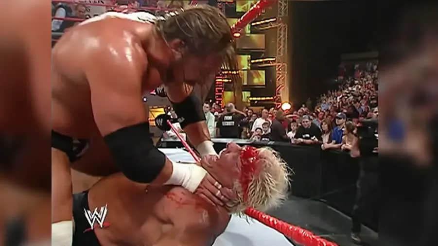 https://cultaholic.com/files/images/3e6aa08cc9773a8dc669aaf128ee6ad75fc3d119-triple-h-ric-flair.jpg