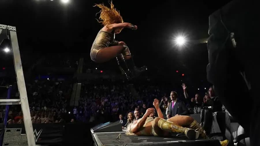 https://cultaholic.com/files/images/8da72a9e7ad34731dec4538b4e1d486502fe8acd-becky-lynch-charlotte-flair-wwe-evolution.jpg