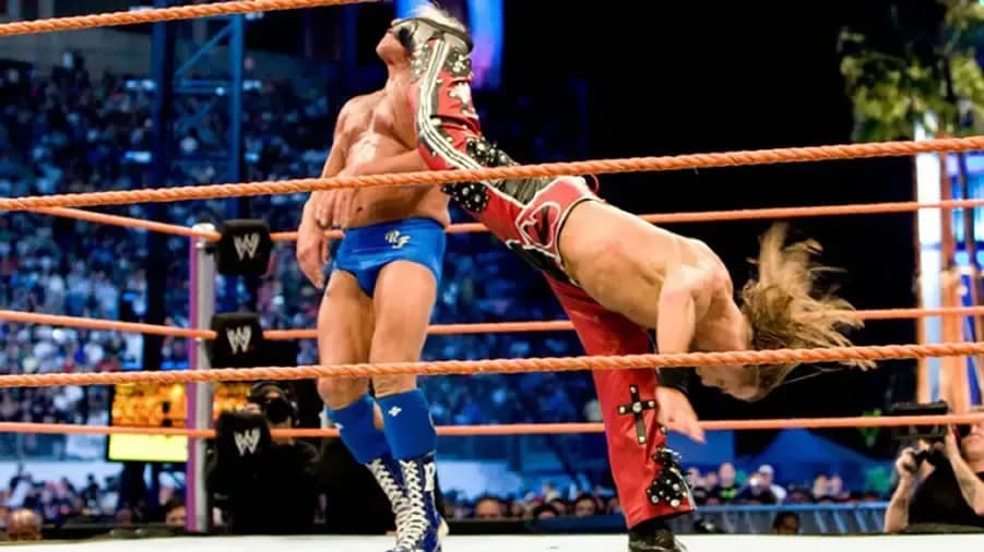 https://cultaholic.com/files/images/95e489ce62221fad8c1d3c74a7bdee7e3b927393-shawn-michaels-ric-flair-sweet-chin-music.jpg