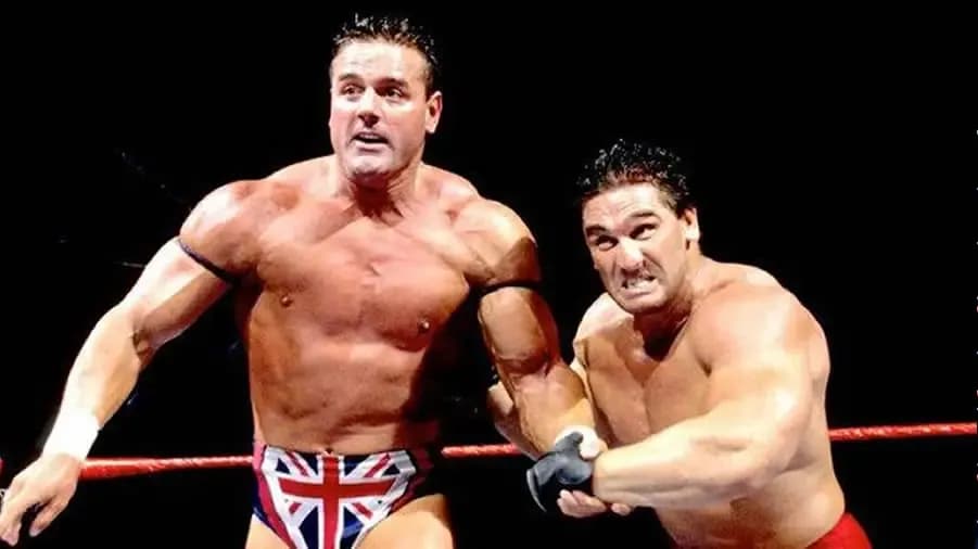 https://cultaholic.com/files/images/b888e382bcec8634bc283ce9005634386edd7aca-BRITISH-BULLDOG-KEN-SHAMROCK-SUMMERSLAM-1997.jpg
