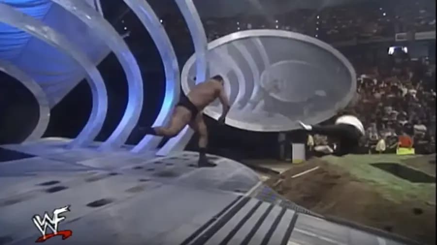 https://cultaholic.com/files/images/bf73ea8e8e6c92f268cbc019c6a8fb623185f471-big-show-mankind-grave.jpg