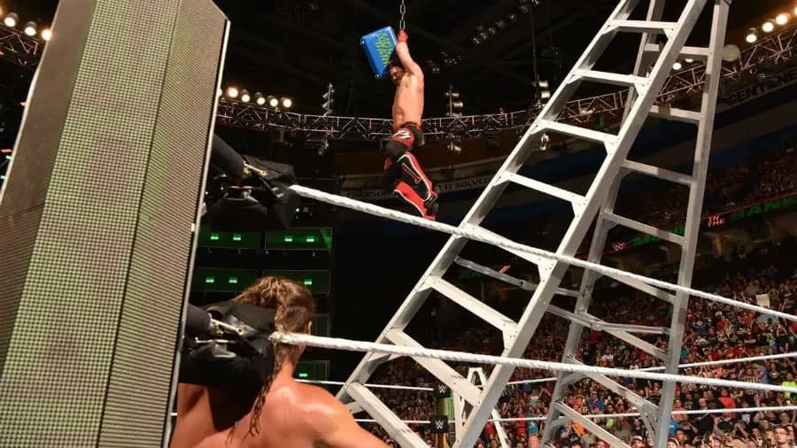 https://cultaholic.com/files/images/cd3c64086c7ba6a0890331a2bff15f7bb4fd2ee9-AJ-Styles-Money-In-The-Bank.jpg