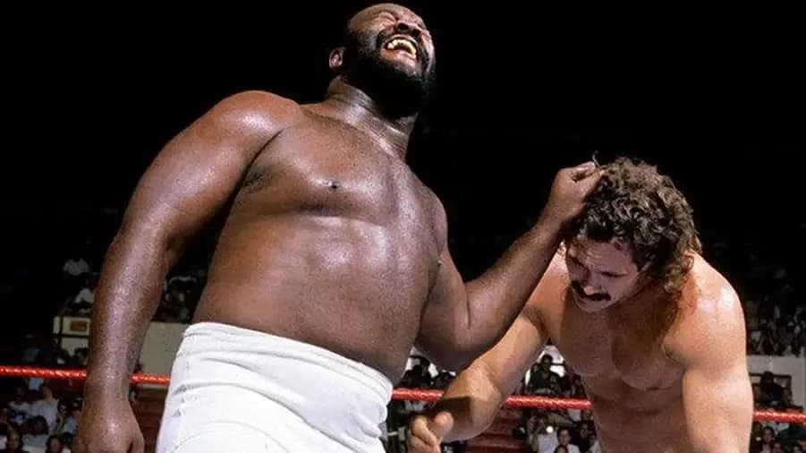 https://cultaholic.com/files/images/cdc58b84248decee47b087323fcd676c8b849dfc-junkyard-dog-rick-rude-summerslam-1988.jpg