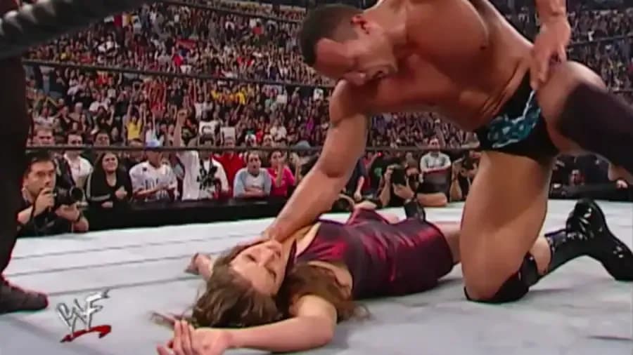 https://cultaholic.com/files/images/e3a19f9e75fdfee49f8865dd8f2fed7f7af5a605-Stephanie-McMahon-The-Rock.png