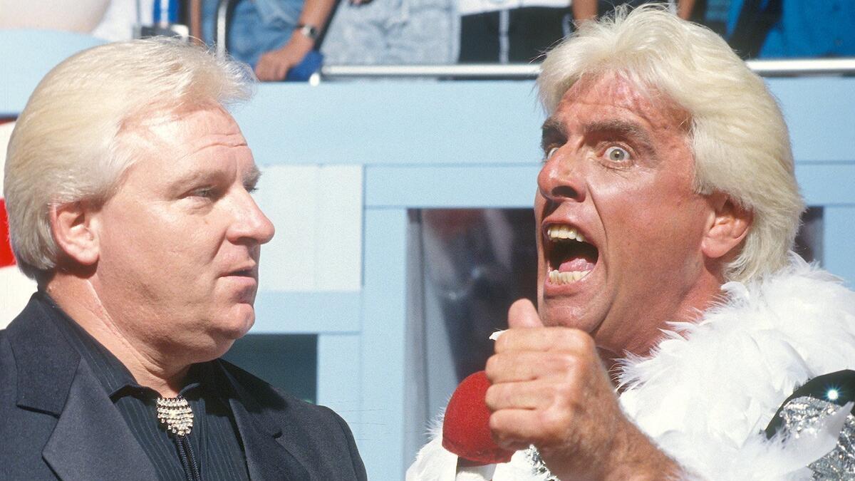 Bobby Heenan with Ric Flair as he cuts a promo