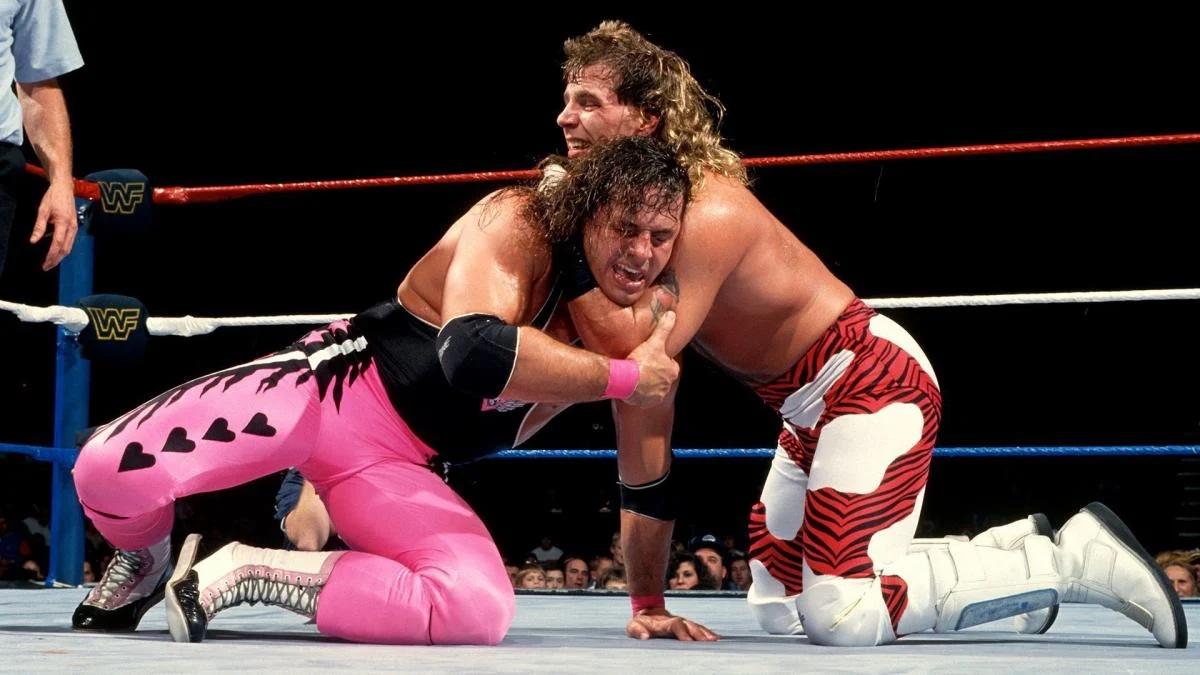 Shawn Michaels with Bret Hart in a headlock at WWE Survivor Series 1992