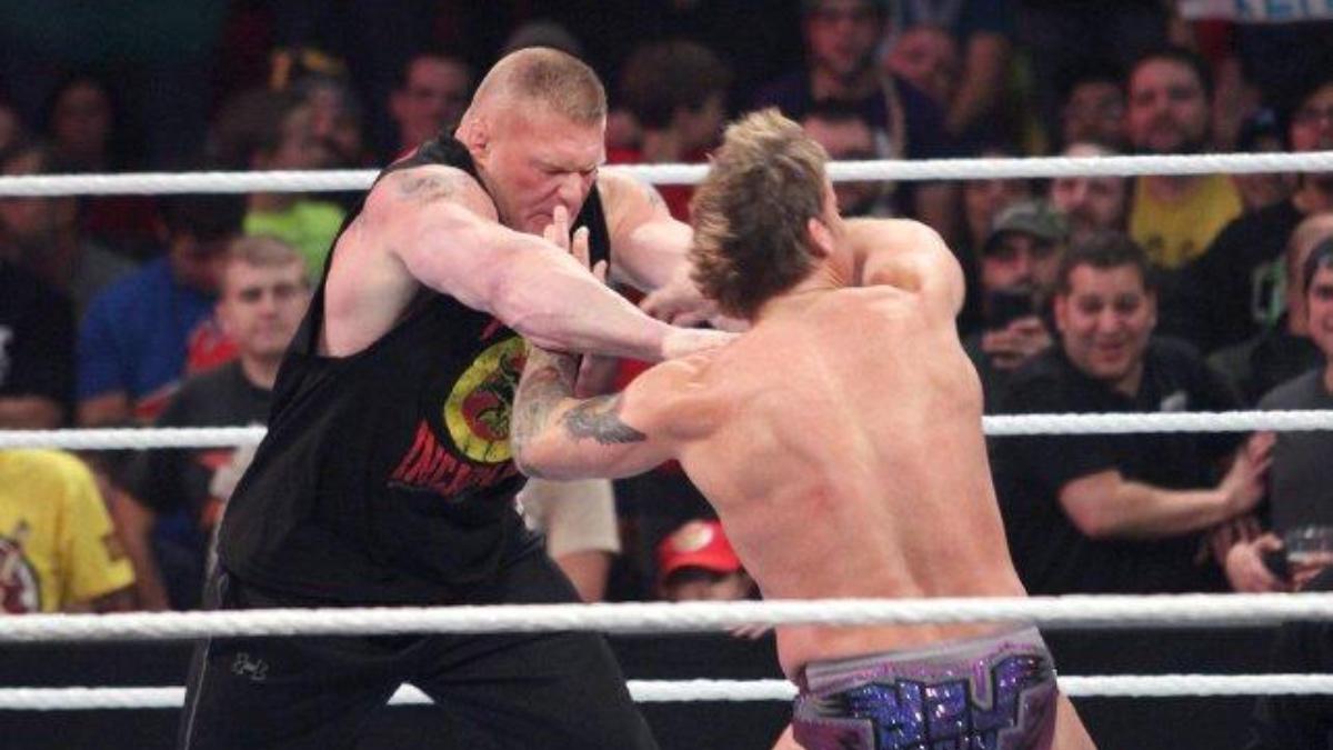 Chris Jericho and Brock Lesnar grappling on December 2014 episode of WWE Raw