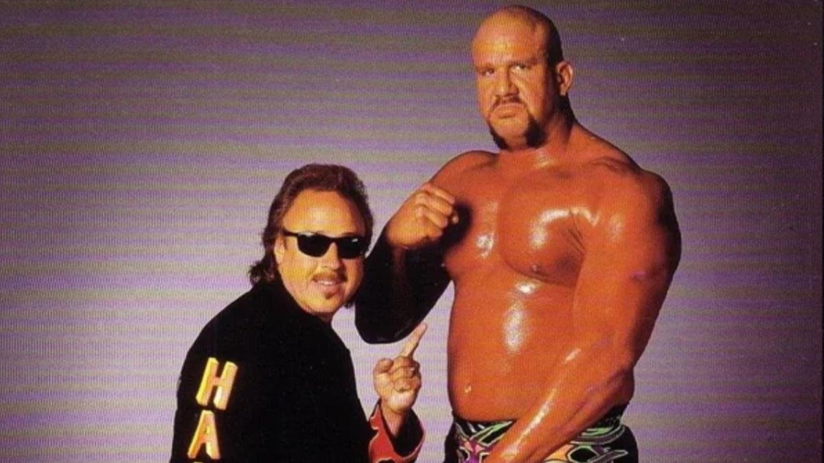 Jimmy Hart and Hail posing for a photoshoot