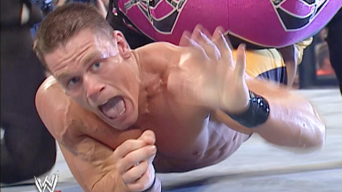 John Cena tapping out to Chris Jericho's Walls of Jericho in 2002