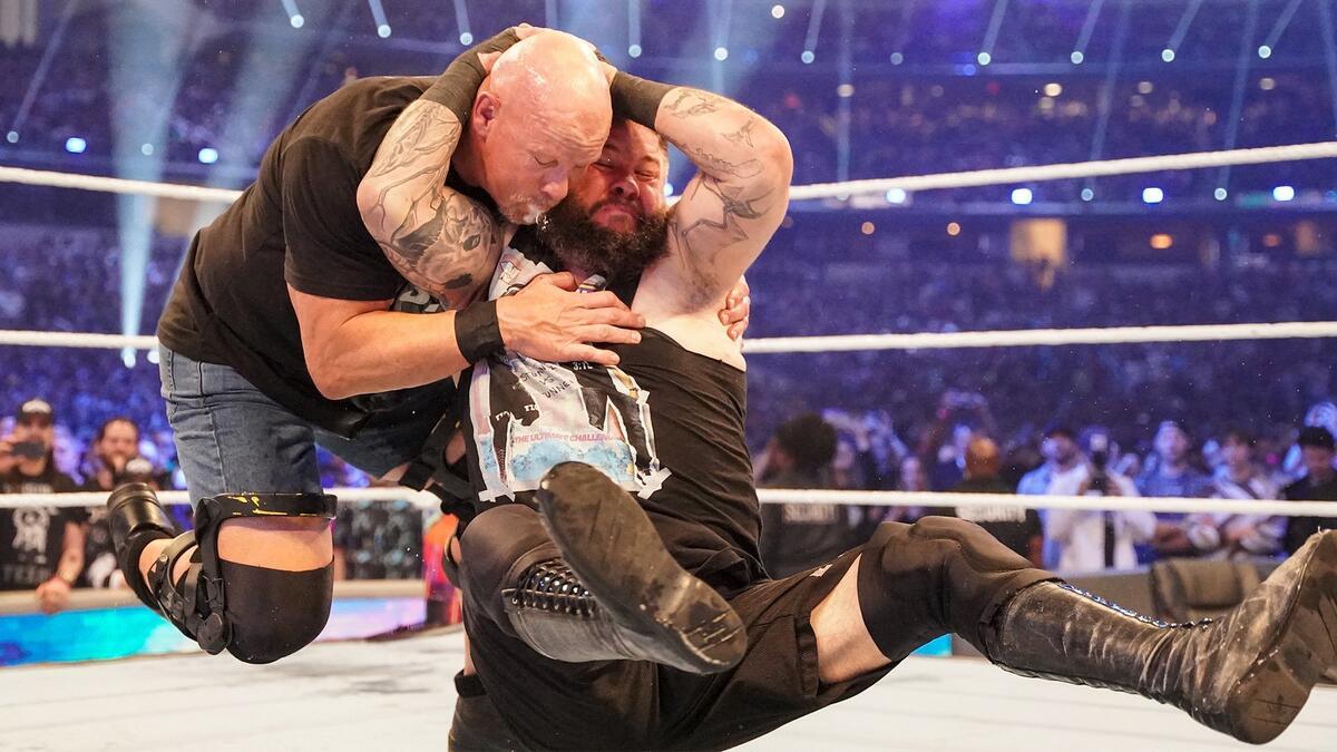 Kevin Owens hitting a stunner to Steve Austin at WWE WrestleMania 38