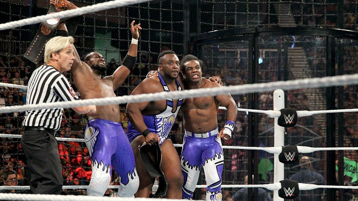 The New Day celebrating inside the Elimination Chamber