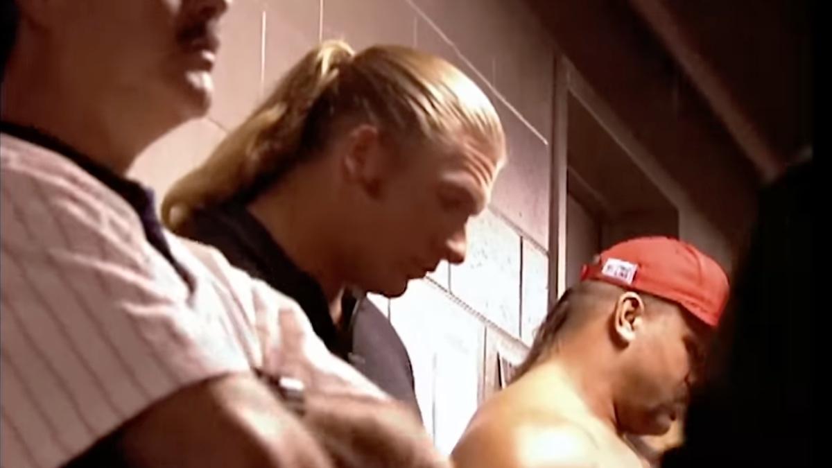 Triple H looking down while backstage at Montreal Screwjob