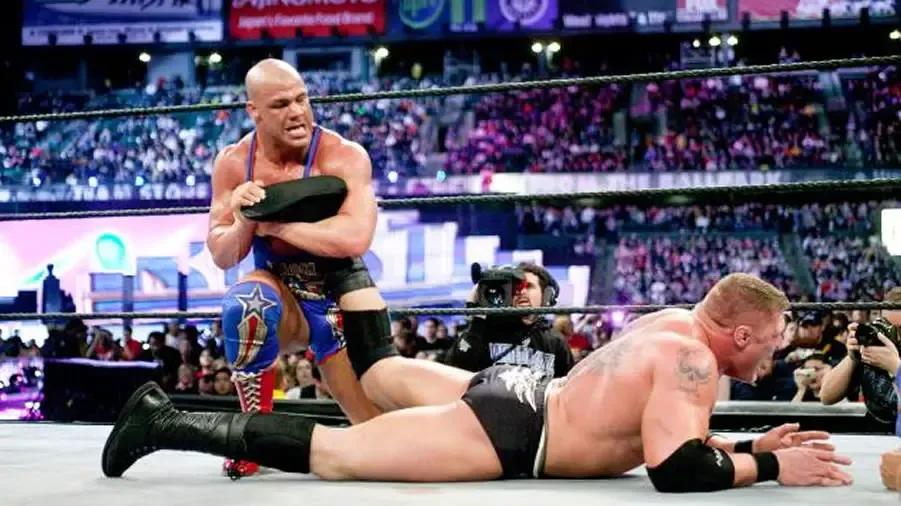 https://cultaholic.com/files/images/0a403e594275016c02d6499a8de324f3cd2769c0-KURT-ANGLE-BROCK-LESNAR-WRESTLEMANIA-XIX.jpg