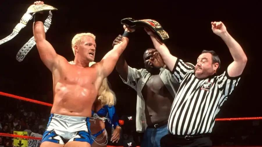 https://cultaholic.com/files/images/58edd48f0133757f96b3dab01a1070a227137e8d-jeff-jarrett-mark-henry-summerslam-1999.jpg