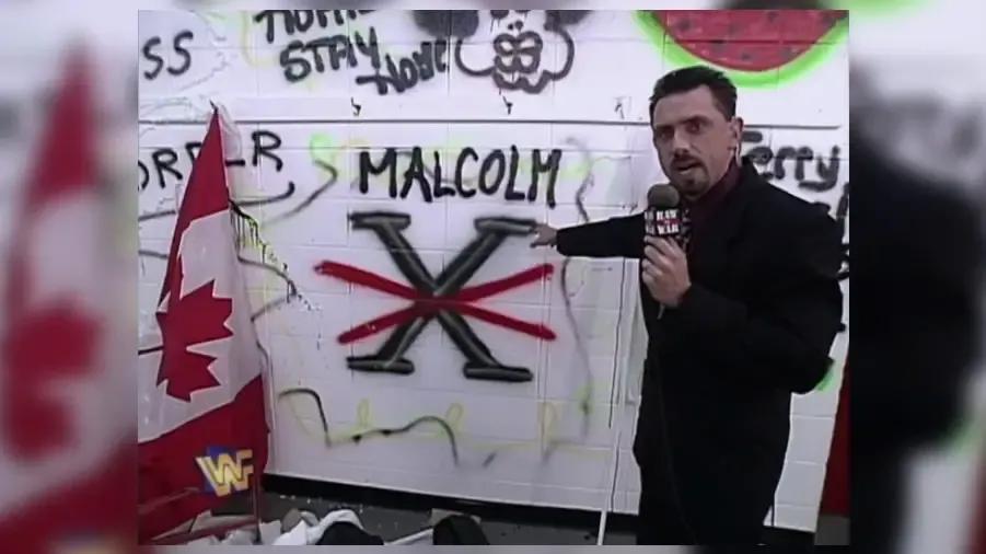 https://cultaholic.com/files/images/94130bf54e9f59f38f06f8258aa36df26db55064-michael-cole-dx-nation-of-domination-locker-room.jpg