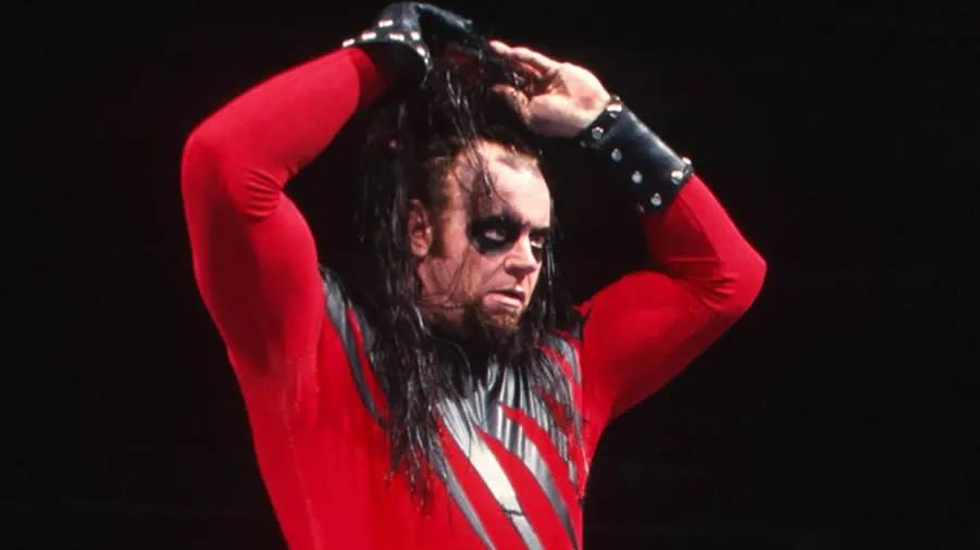 https://cultaholic.com/files/images/97d2a863b723578b0a9f4935fc346f36c1bc3235-the-undertaker-dressed-as-kane.jpg